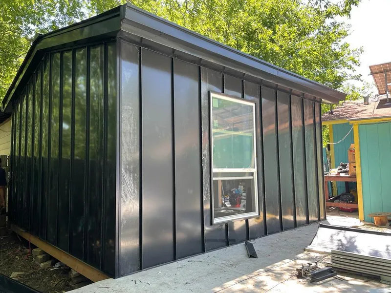 Black standing seam metal wall panels for Metal Roof Installation in Hapeville